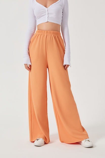 COMFORTABLE WIDE-LEG TROUSERS