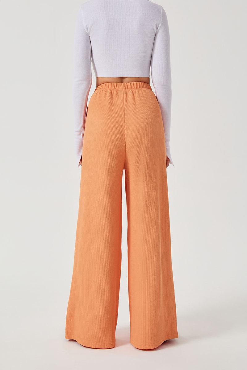 COMFORTABLE WIDE-LEG TROUSERS